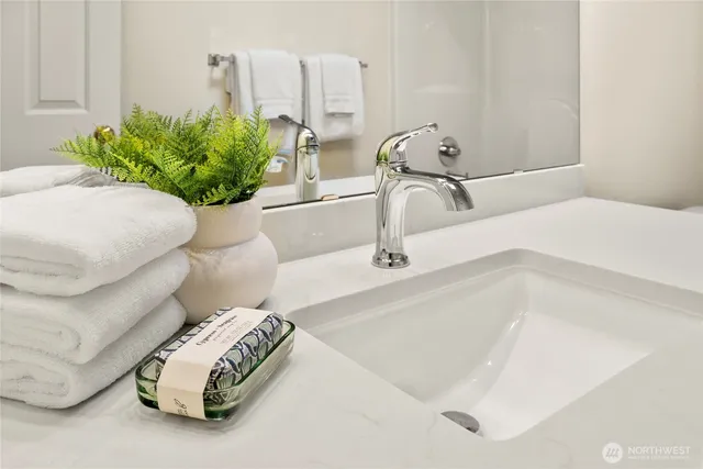 a bathroom with a sink and a bathtub