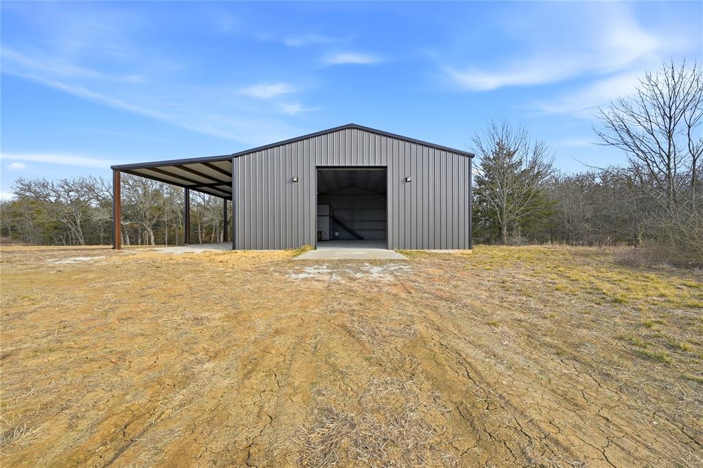 1807 Pink Hill Road Bells, TX 75414 - Photo 11 of 31 a view of a house with a outdoor space