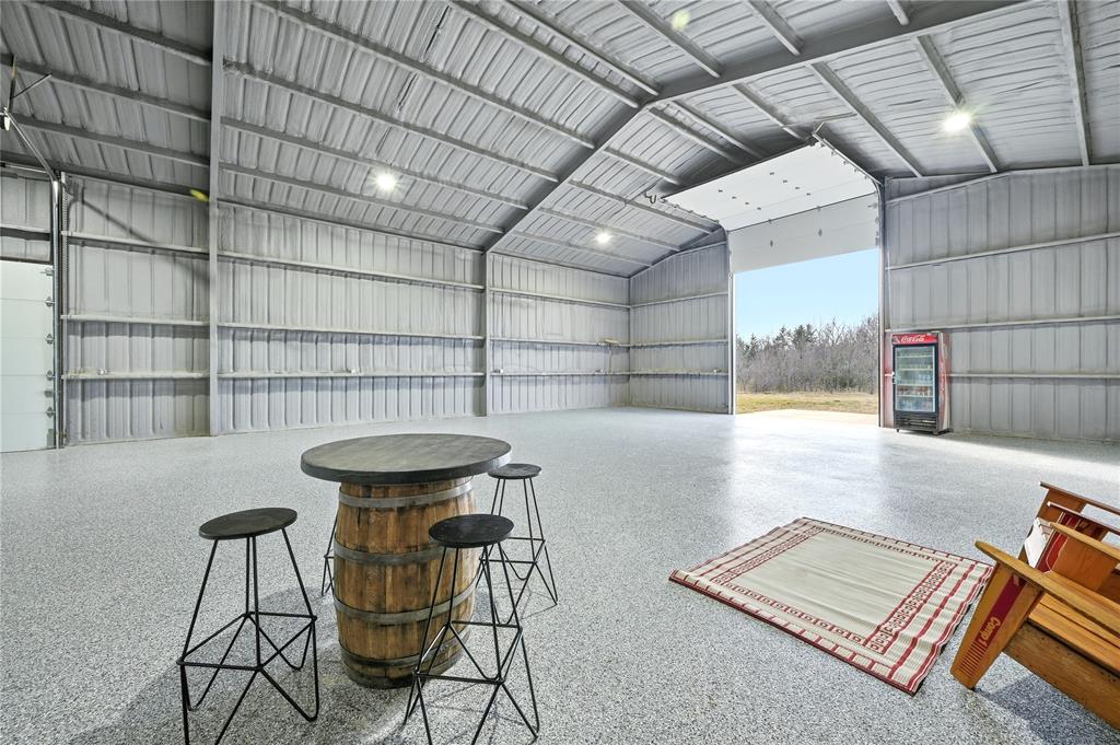 1807 Pink Hill Road Bells, TX 75414 - Photo 16 of 31 a view of a room with furniture and a rug