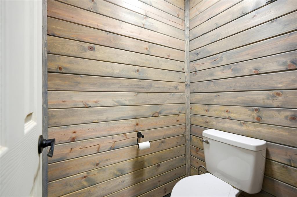 1807 Pink Hill Road Bells, TX 75414 - Photo 21 of 31 a bathroom with a toilet and a shower