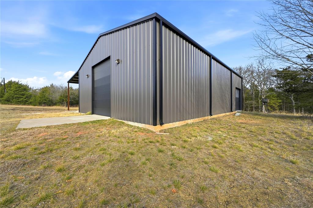 1807 Pink Hill Road Bells, TX 75414 - Photo 24 of 31 a view of a backyard of the house