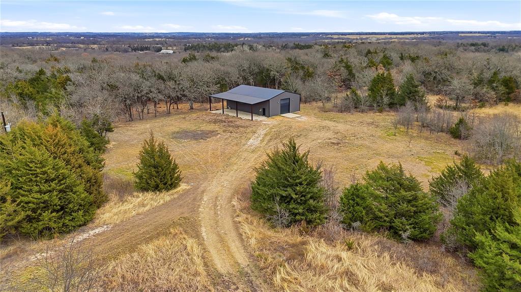 1807 Pink Hill Road Bells, TX 75414 - Photo 3 of 31 a view of a yard with an outdoor space