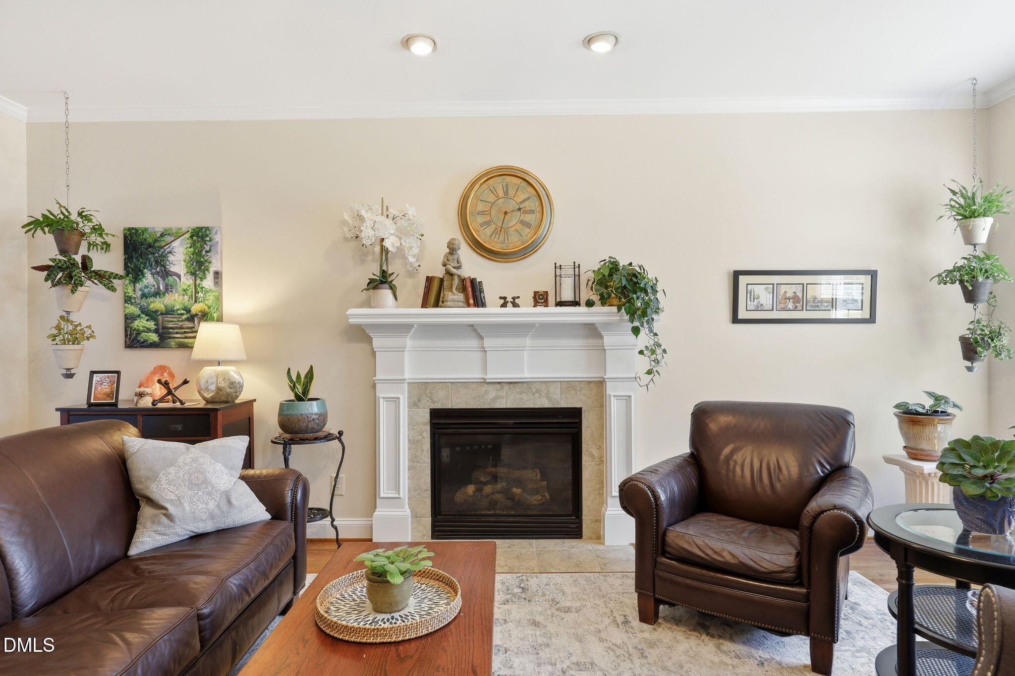 7040 Dayton Ridge Drive Apex, NC 27539 - Photo 3 of 38 a living room with furniture and a fireplace