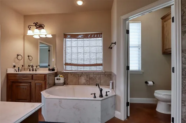 a utility room with a sink a washer and dryer