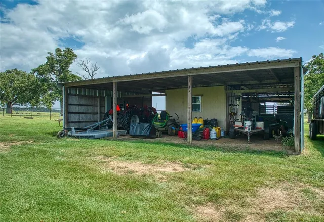 a view of a backyard of the house