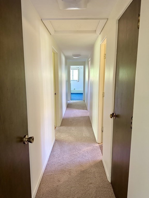 44 Hampton Knolls Road Holyoke, MA 01040 - Photo 16 of 42 a view of a hallway with wooden floor