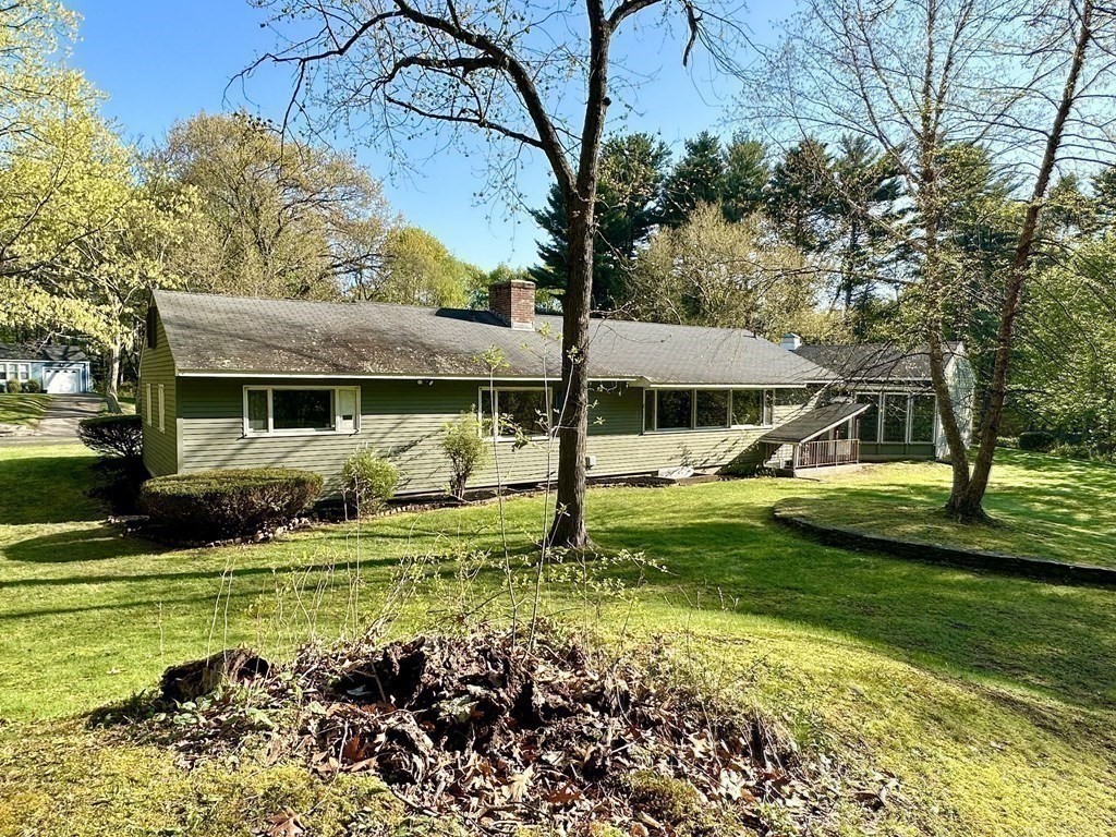 44 Hampton Knolls Road Holyoke, MA 01040 - Photo 36 of 42 a view of a house with backyard and sitting area