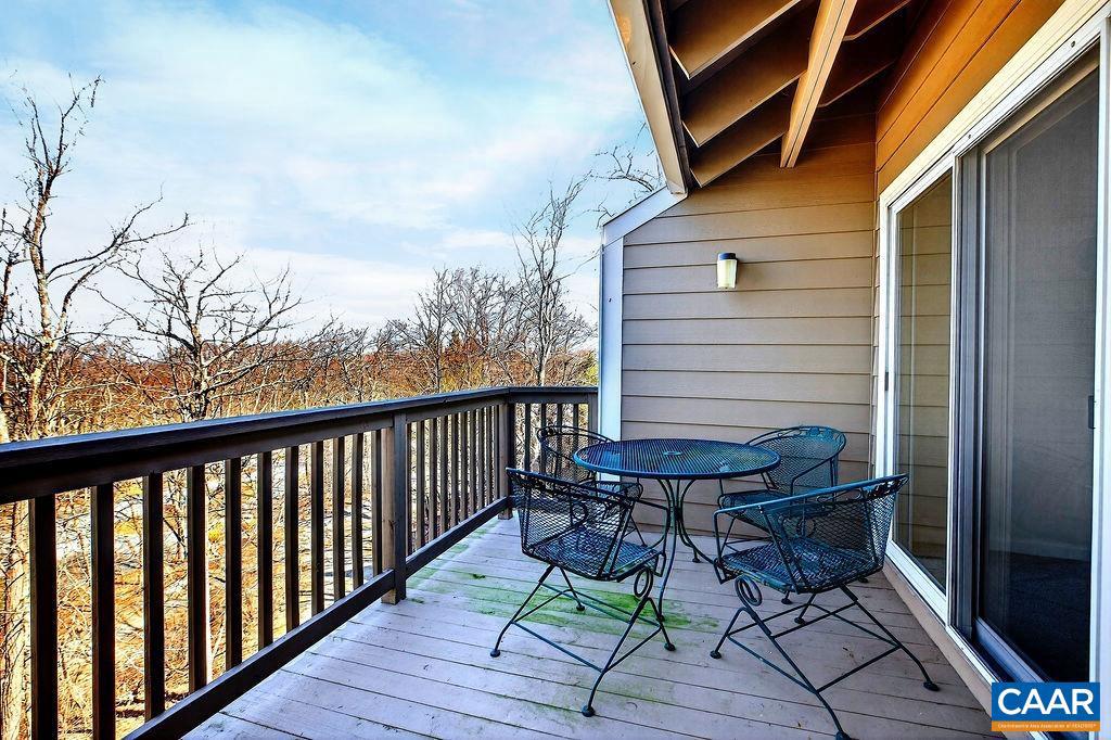 2084 Stone Ridge Wintergreen, VA 22967 - Photo 15 of 41 a view of a chairs and table on the deck