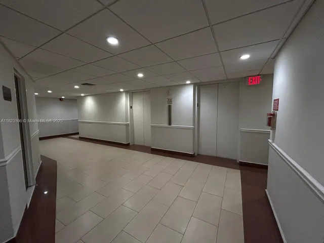 a view of hallway with a projector