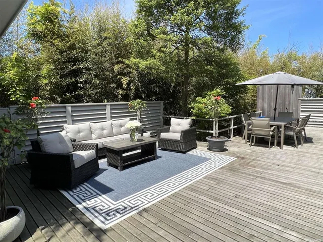 a terrace view with sitting space and seating space