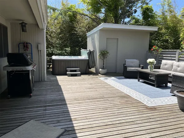 a view of a terrace with furniture
