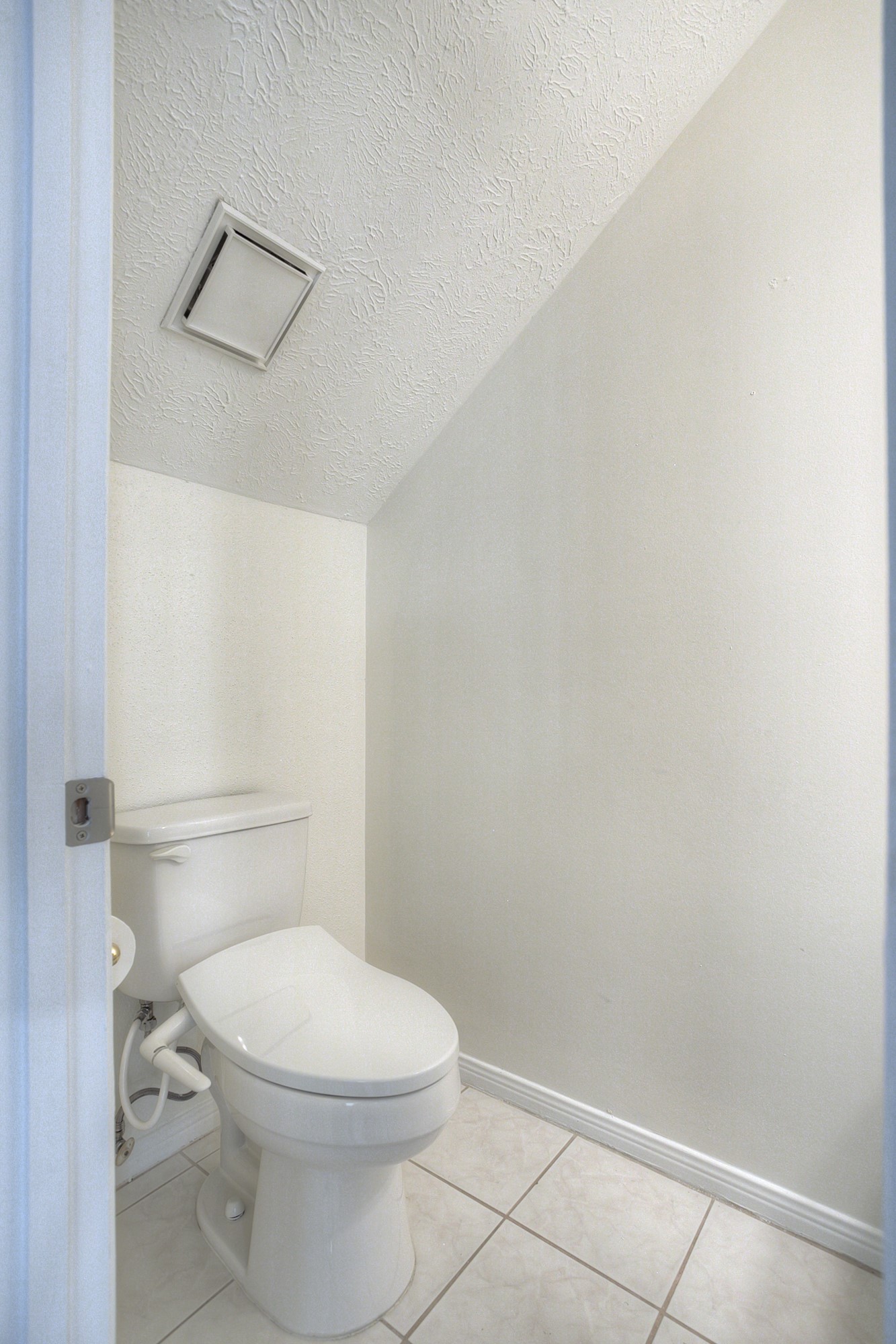 287 Broadmoor Street Trinity, TX 75862 - Photo 17 of 36 A glimpse into the half bath downstairs.