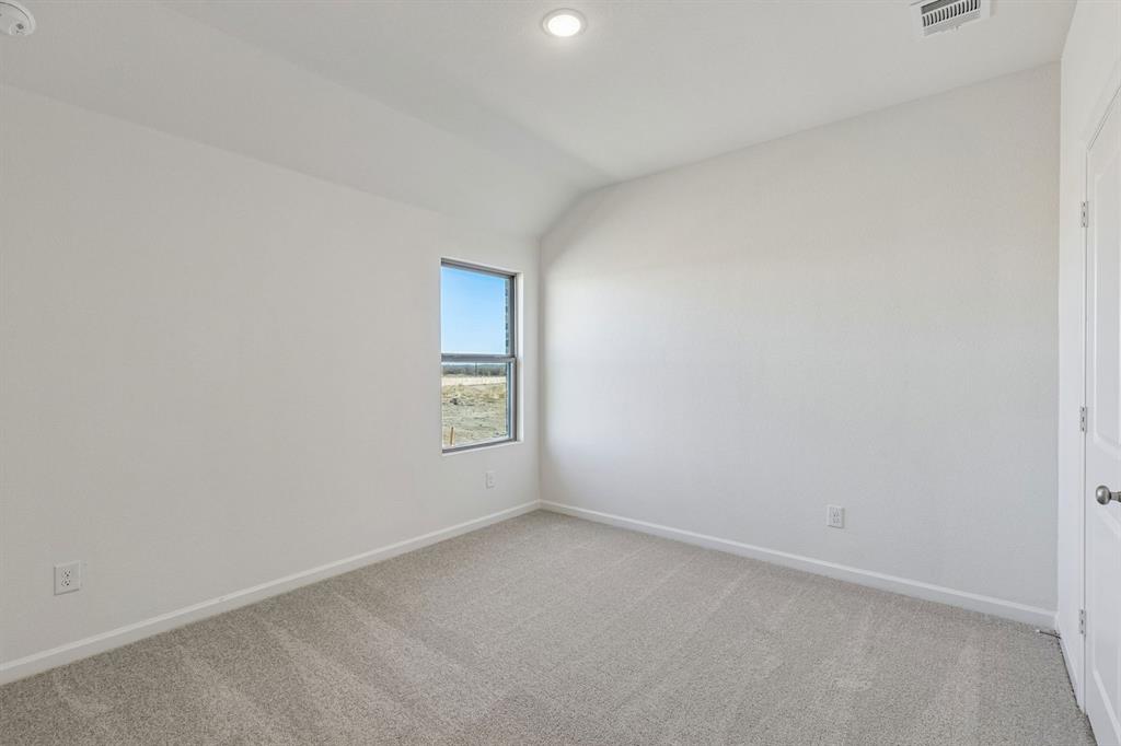 3820 Prairie Chapel Road Royse City, TX 75189 - Photo 13 of 18 a view of an empty room and a window