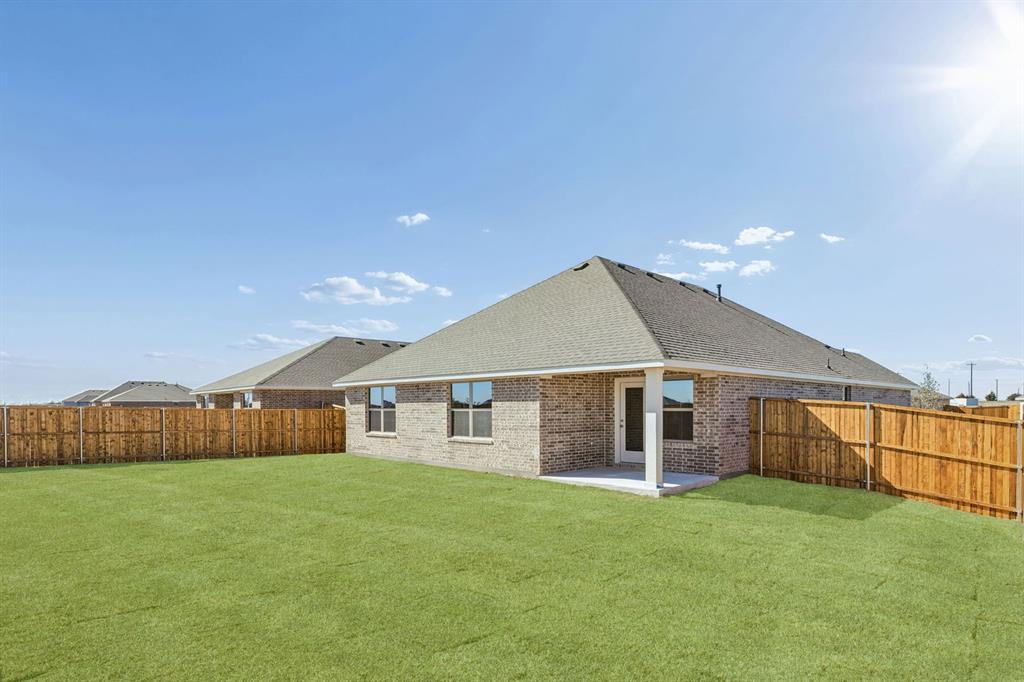 3820 Prairie Chapel Road Royse City, TX 75189 - Photo 17 of 18 a view of a house with backyard and garden