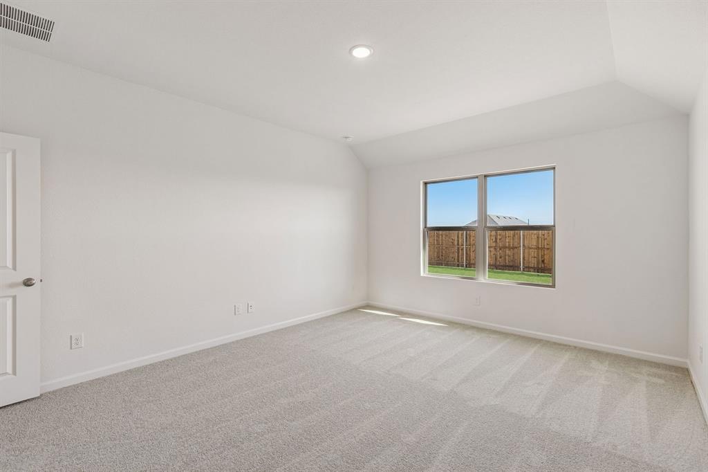3820 Prairie Chapel Road Royse City, TX 75189 - Photo 9 of 18 an empty room with a window