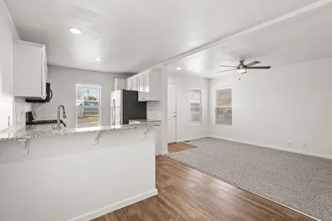 a view of a bathroom from a hallway