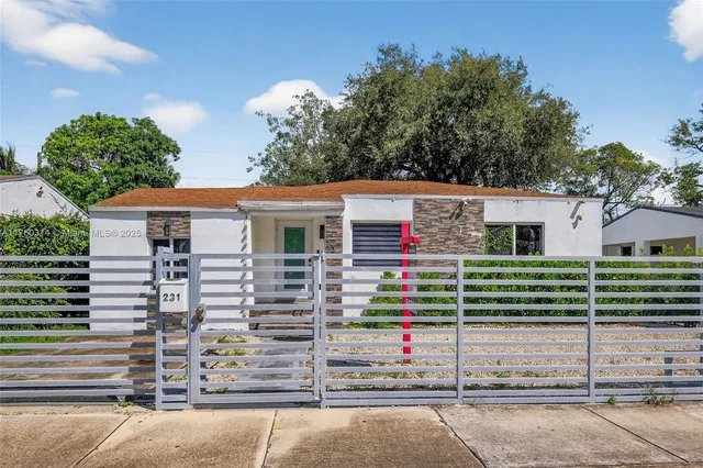 a front view of a house with a garage