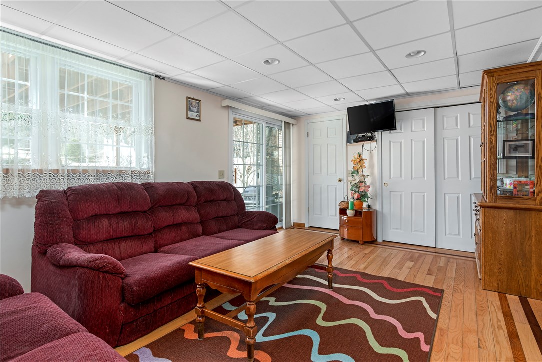 284 8th Avenue Woonsocket, RI 02895 - Photo 17 of 33 Lower level living room