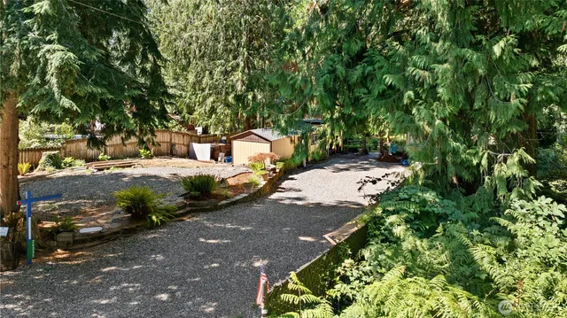 a view of a street with some trees