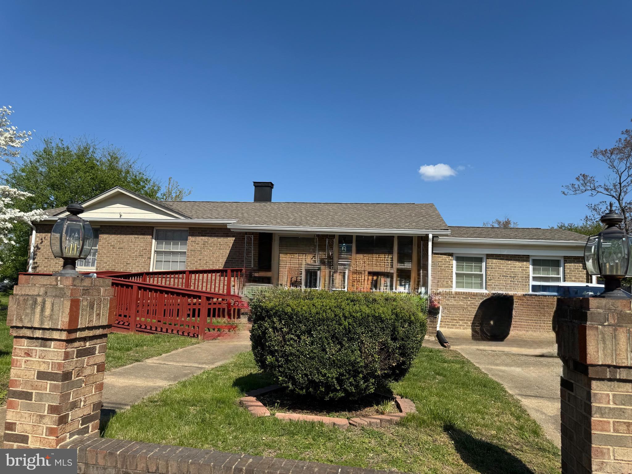 1306 Cardwell Street Fredericksburg, VA 22401 - Photo 2 of 3 a front view of a house with garden