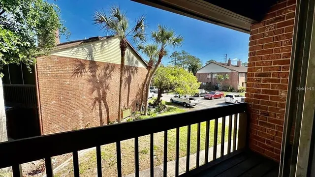 a view of swimming pool from a balcony
