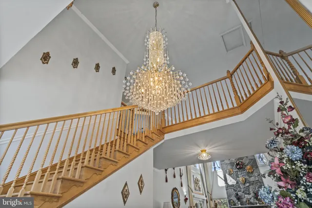 a dining room with furniture window and wooden floor