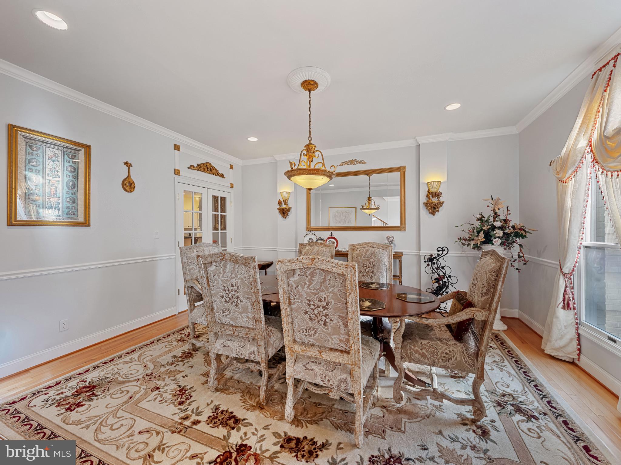 10900 Sunset Hills Road Reston, VA 20190 - Photo 18 of 62 a dining room with furniture window and wooden floor