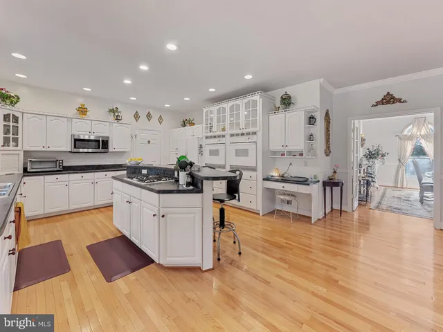 a view of a hallway view with staircase