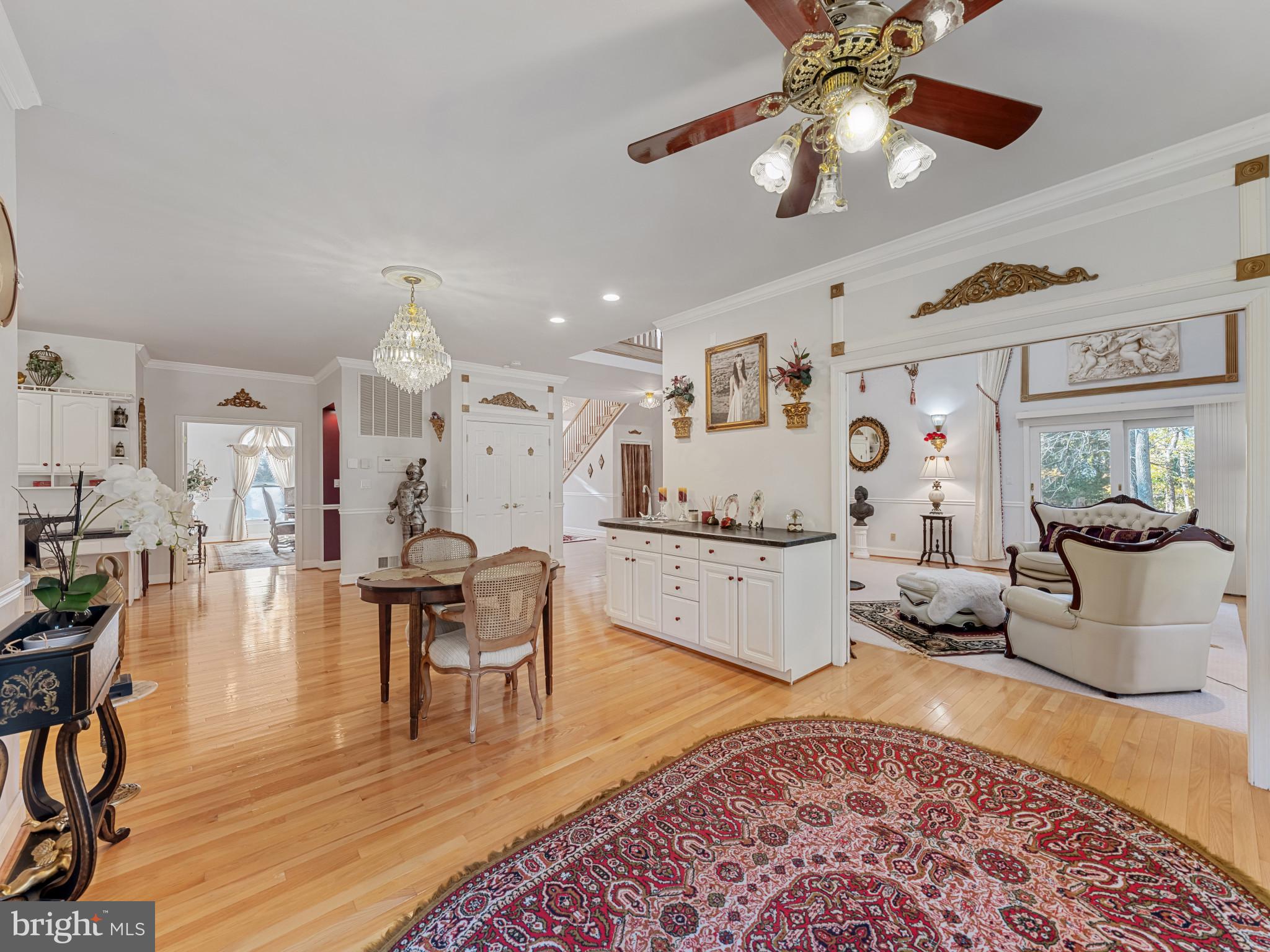 10900 Sunset Hills Road Reston, VA 20190 - Photo 62 of 62 a living room with furniture and view of kitchen