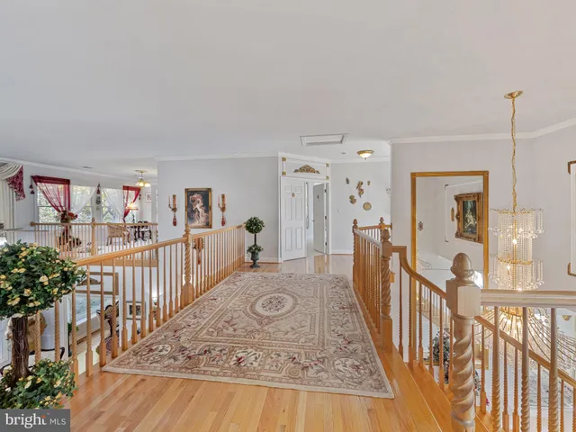 a view of a workspace with furniture and a cabinet