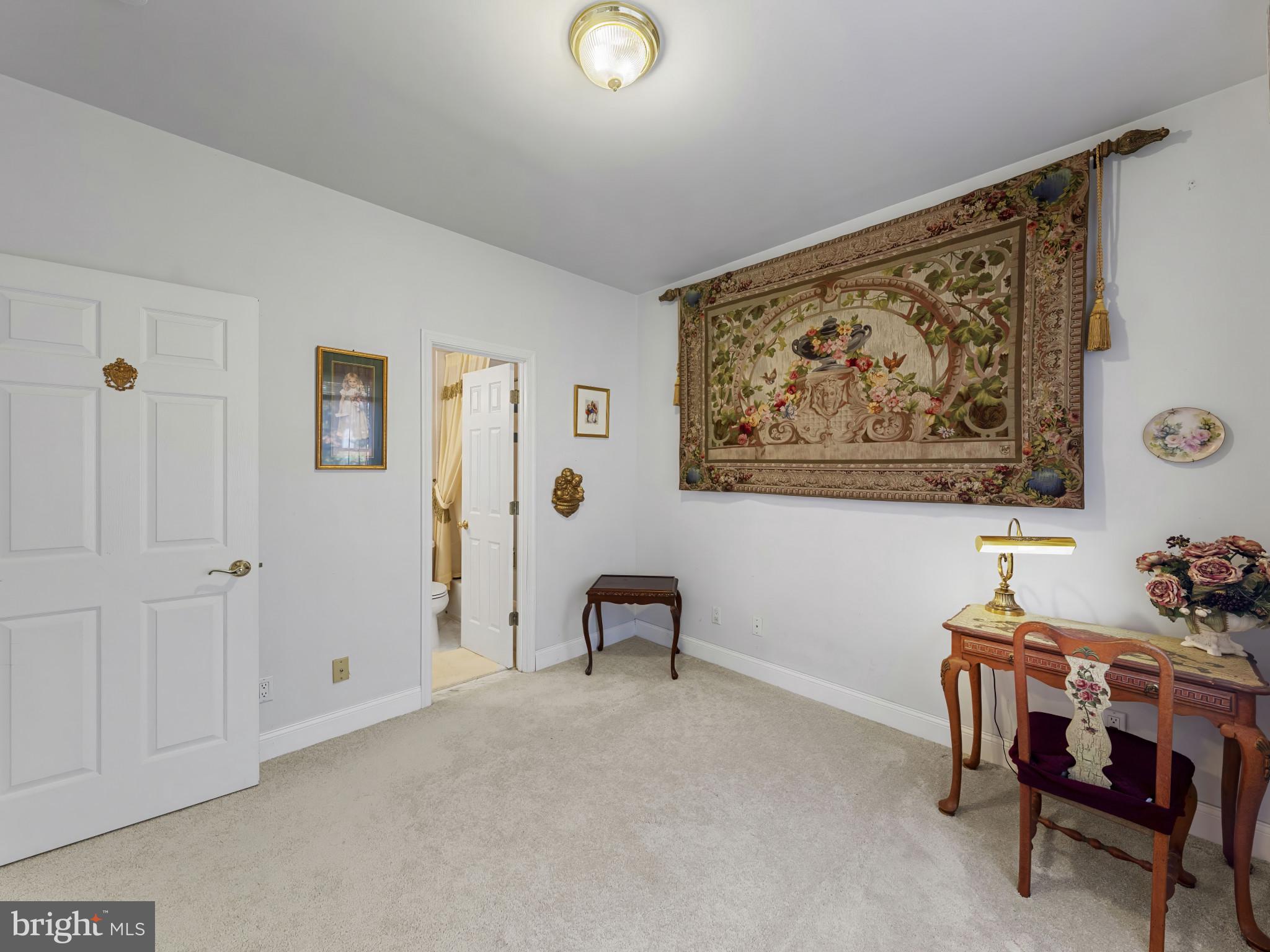 10900 Sunset Hills Road Reston, VA 20190 - Photo 37 of 62 a view of a workspace with furniture and a cabinet