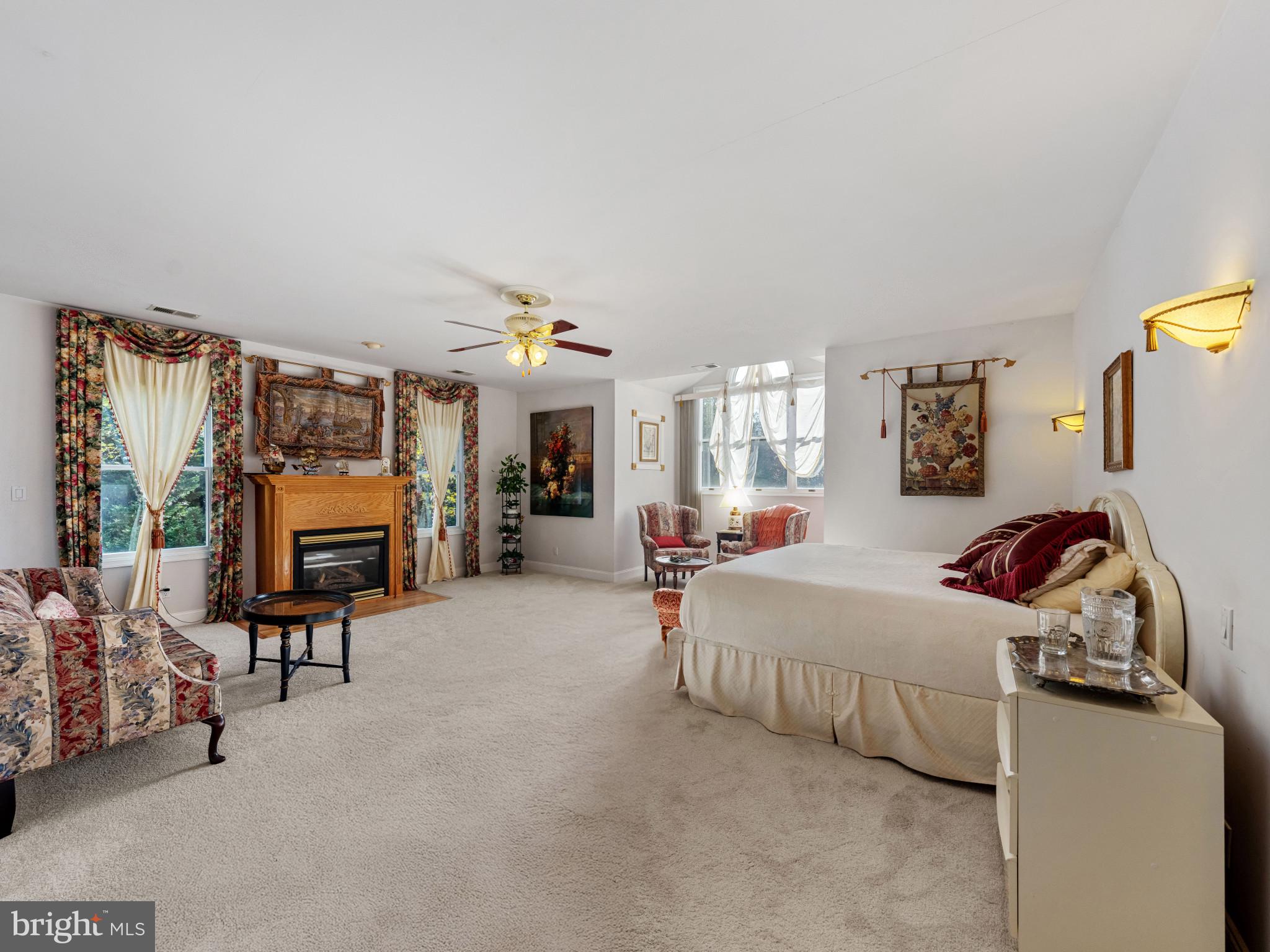 10900 Sunset Hills Road Reston, VA 20190 - Photo 44 of 62 a bedroom with bed and a couch