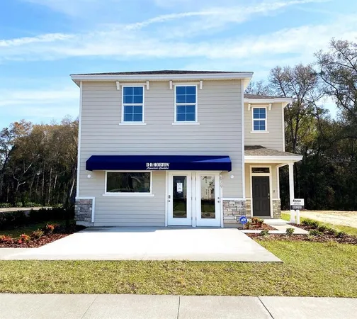 a front view of house with yard