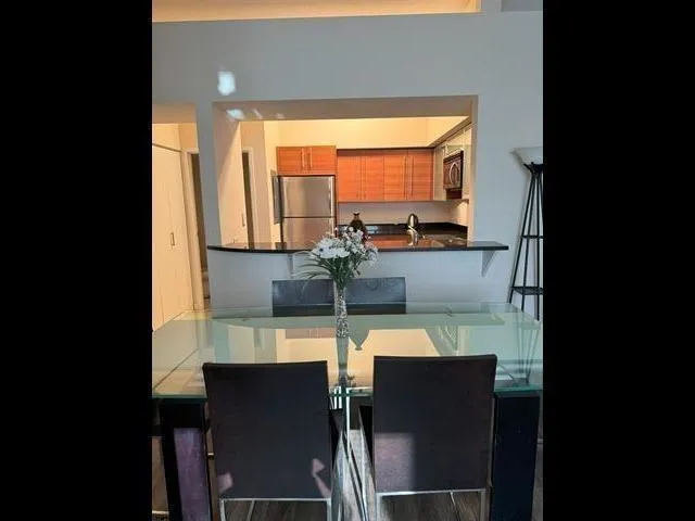 a kitchen with a stove and a microwave