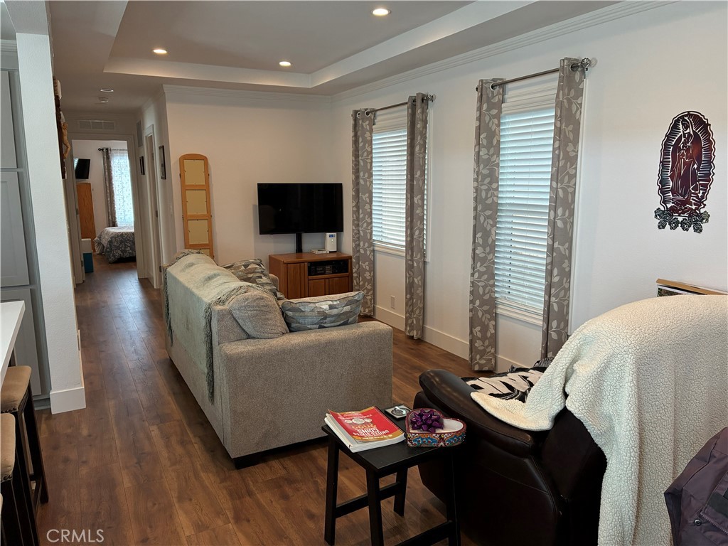 655 South Halcyon Road Arroyo Grande, CA 93420 - Photo 3 of 12 a living room with furniture and a flat screen tv