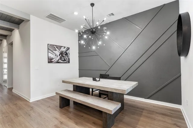 a room with furniture and a chandelier