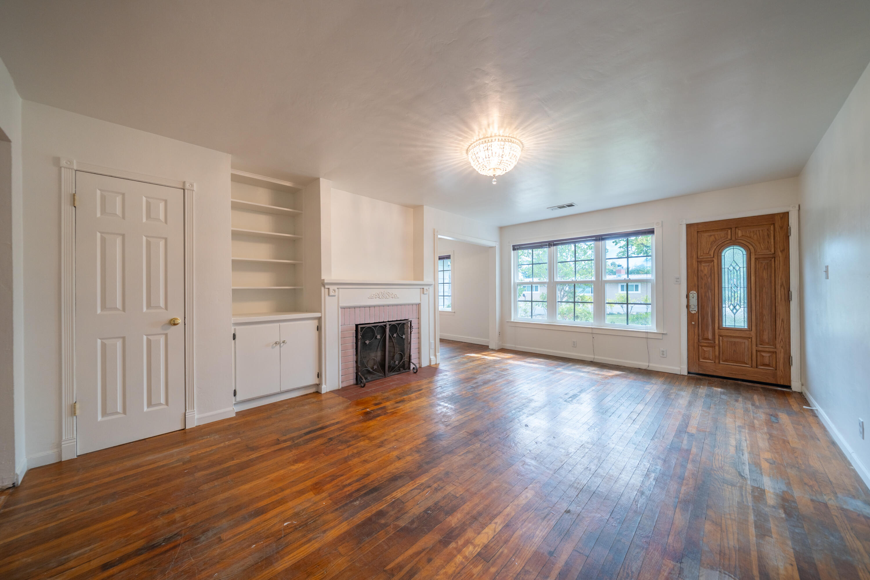3500 Longview Avenue Redding, CA 96001 - Photo 2 of 25 a view of an empty room with wooden floor and a window