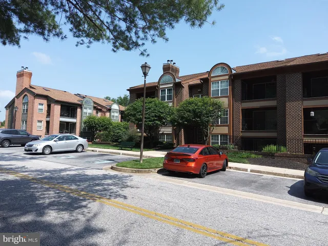 a car parked in front of a house