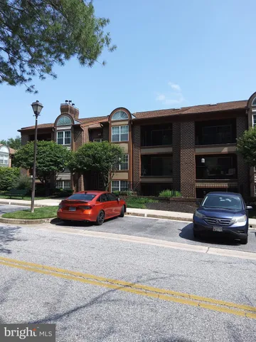 a car parked in front of a house
