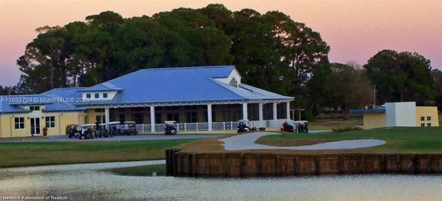 a view of swimming pool with yard