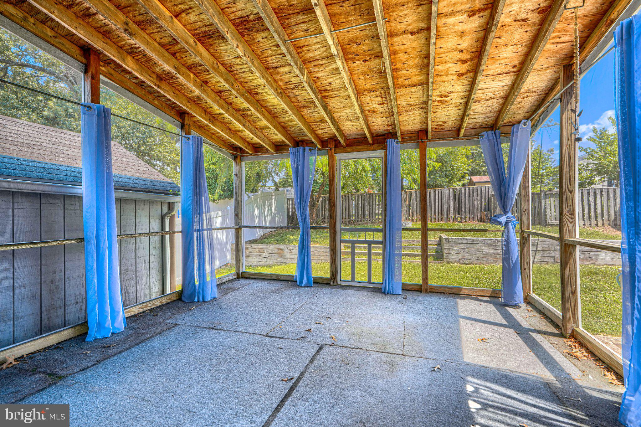 3460 Brookhaven Road Pasadena, MD 21122 - Photo 21 of 27 Bright and airy screened porch retreat.