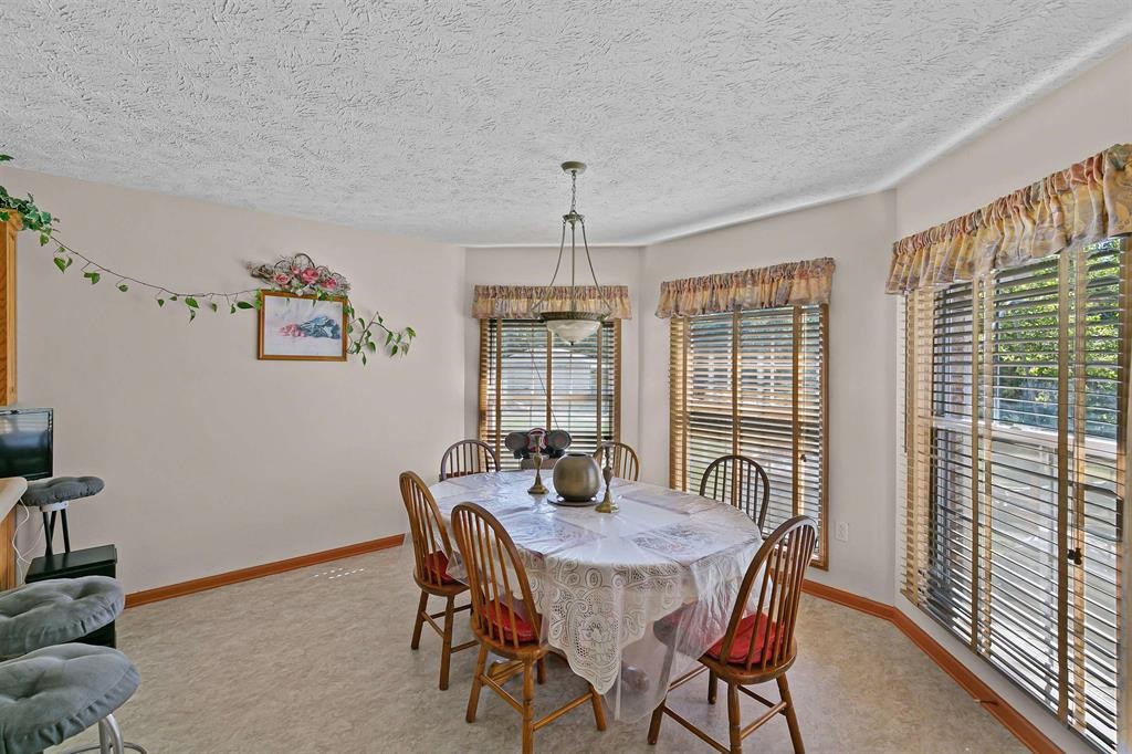 1150 Tyler Road Lexington, TN 38351 - Photo 6 of 24 a view of a dining room with furniture window and outside view