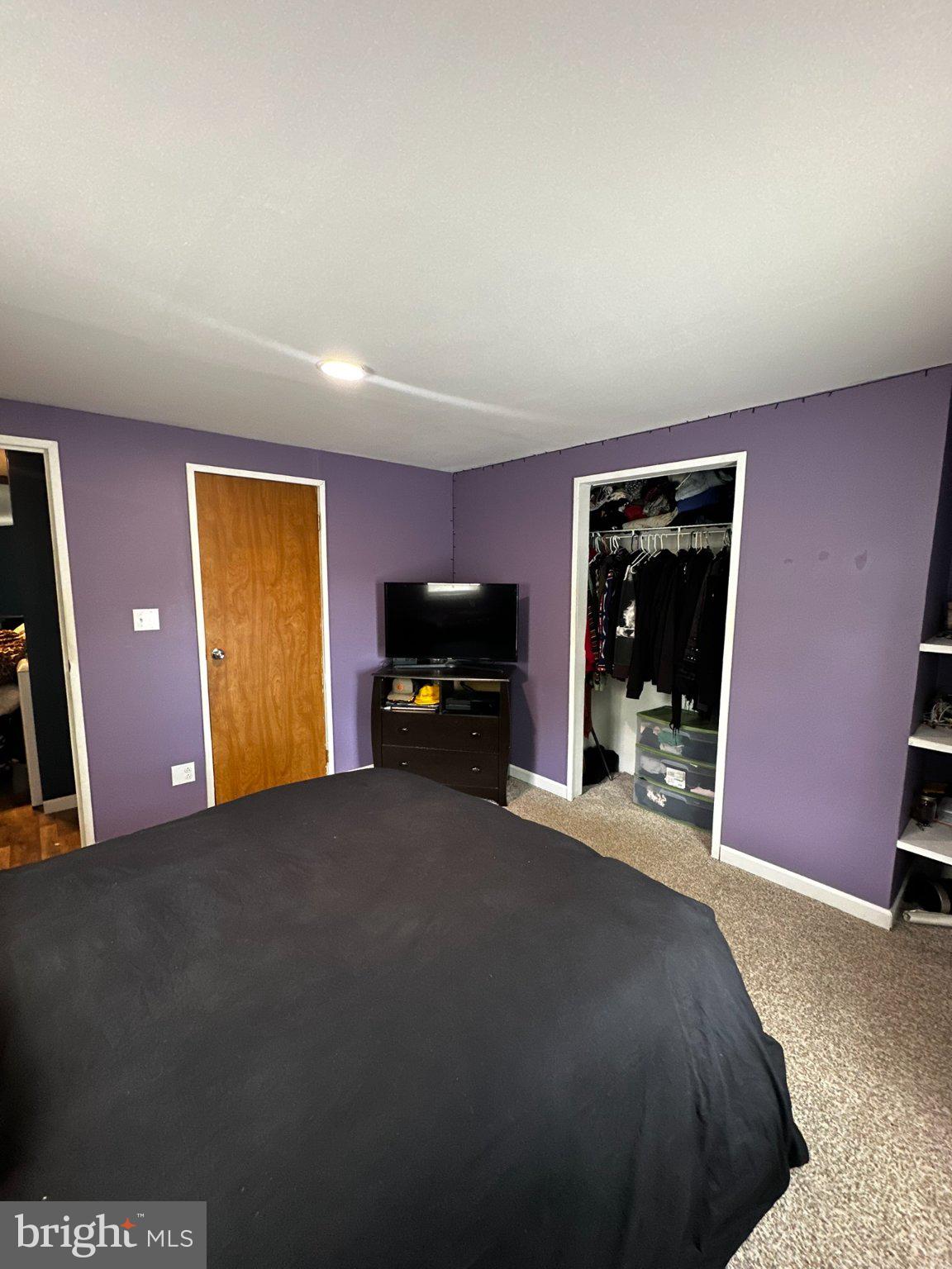 31777 Siham Road Lewes, DE 19958 - Photo 16 of 46 Cozy purple-hued bedroom retreat.
