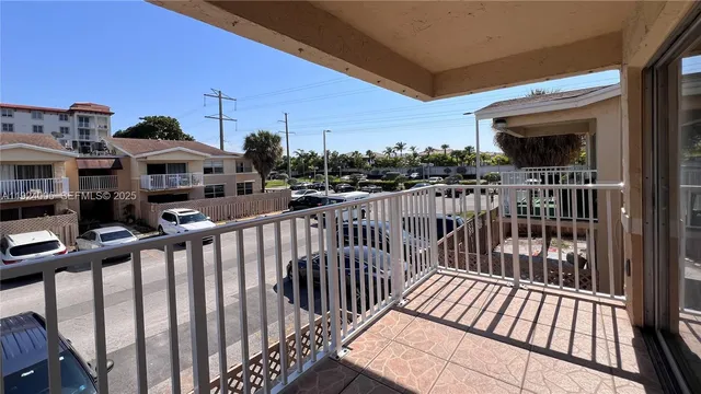 a bathroom with a sink and a shower curtain