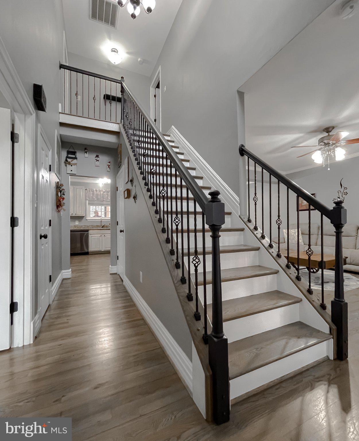 400 Adelina Road Prince Frederick, MD 20678 - Photo 29 of 57 Inviting entryway with elegant staircase.