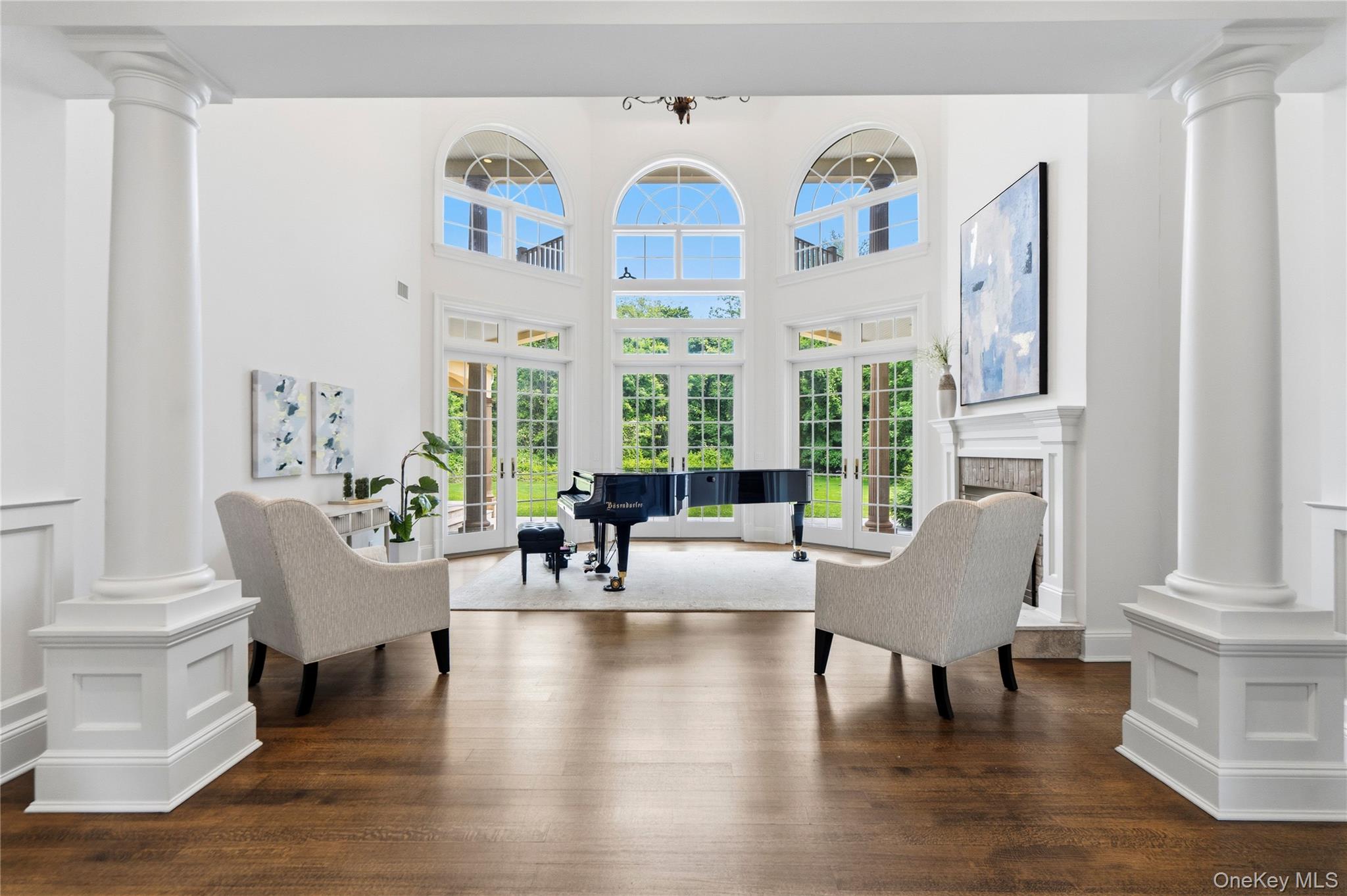 1960 Midlane Road South Syosset, NY 11791 - Photo 4 of 46 a living room with fireplace furniture and a large window