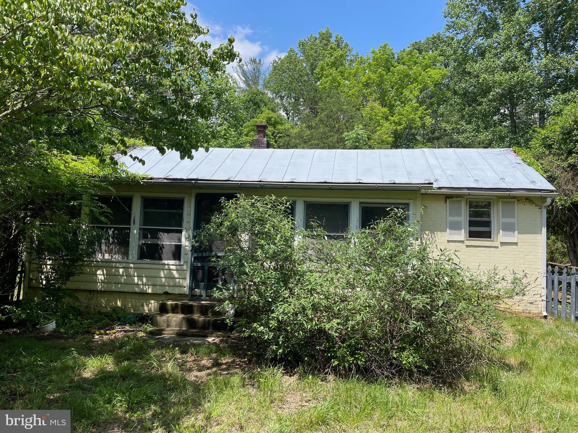 240 Whorton Hollow Road Castleton, VA 22716 - Photo 1 of 9 Brick Main cottage (front)
