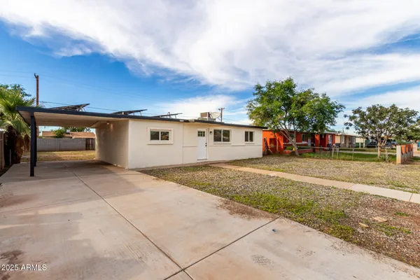 a view of street with parked cars