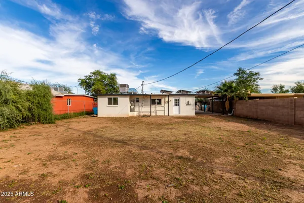 a big yard with large trees