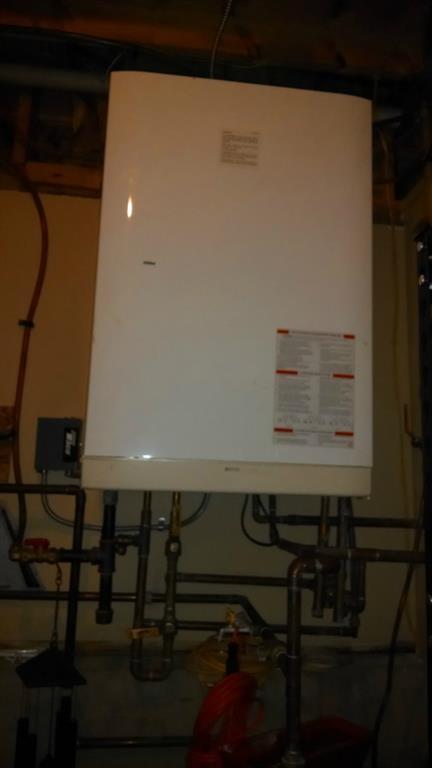 230 East Newport Road Stetson, ME 04488 - Photo 31 of 34 Propane boiler.